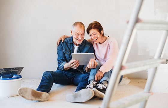 Couple looking at an iPad