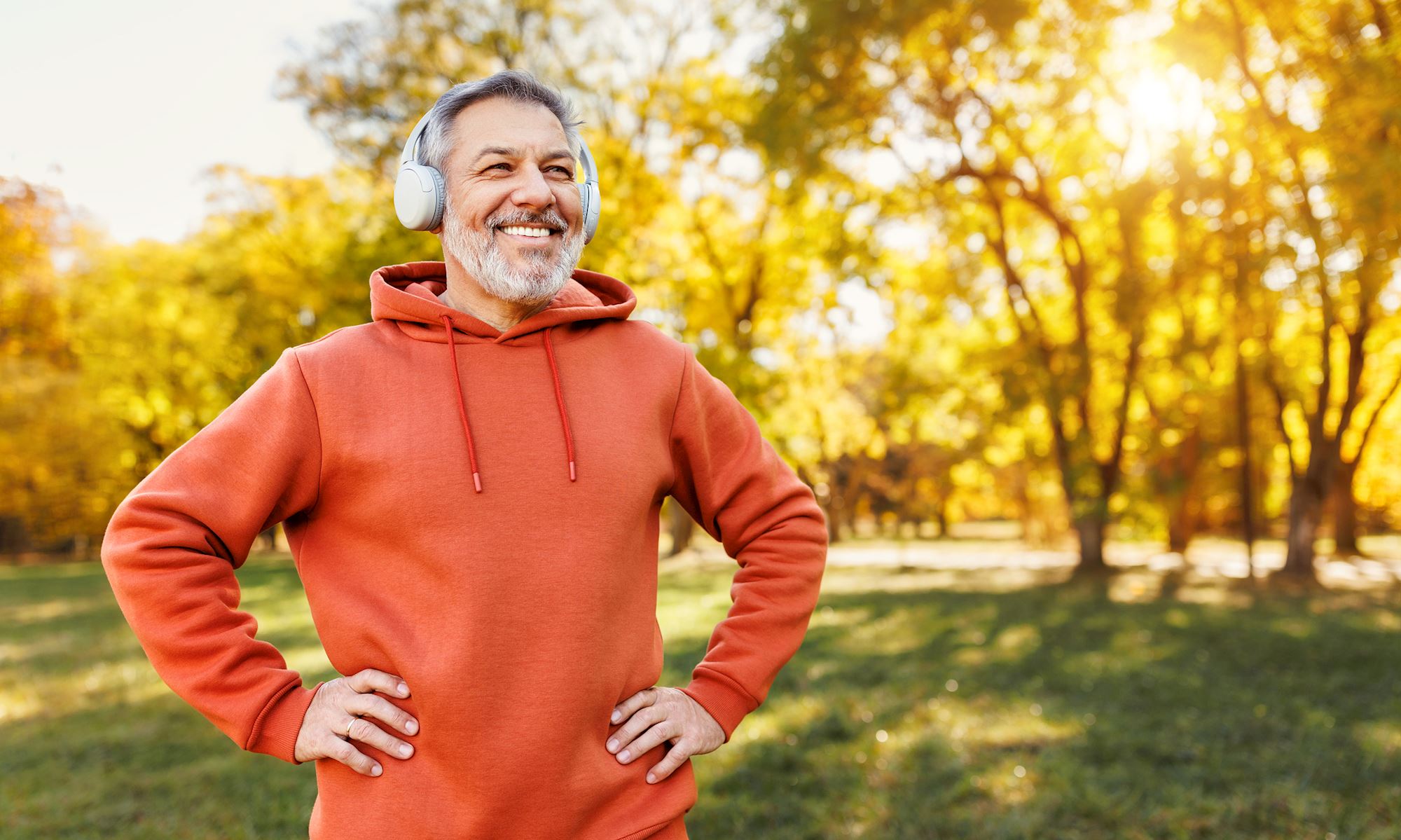 Man happily exercising on a sunny winters day